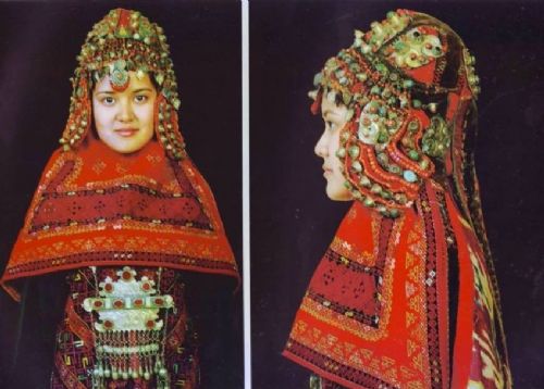 fig 1. A RARE UZBEK KARAKALPAK LADIES EMBROIDERED WEDDING VEIL WITH SILK IKAT BACK, 19TH CENTURY.