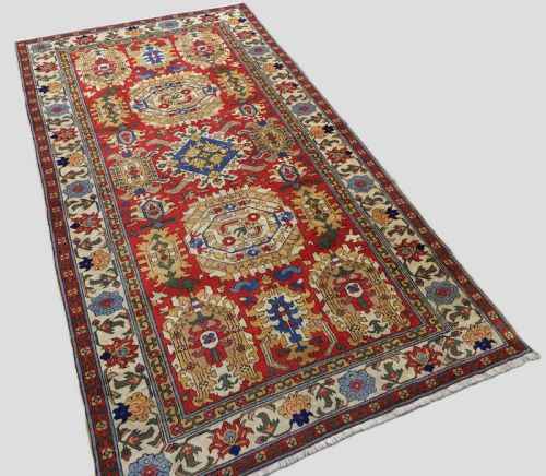ANTIQUE RUG IN THE STYLE OF A CAUCASIAN KARABAGH 18TH CENTURY 'BLOSSOM' RUG CIRCA 1920 - ADDITIONAL PHOTO 1