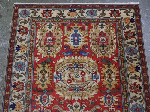 ANTIQUE RUG IN THE STYLE OF A CAUCASIAN KARABAGH 18TH CENTURY 'BLOSSOM' RUG CIRCA 1920 - ADDITIONAL PHOTO 2