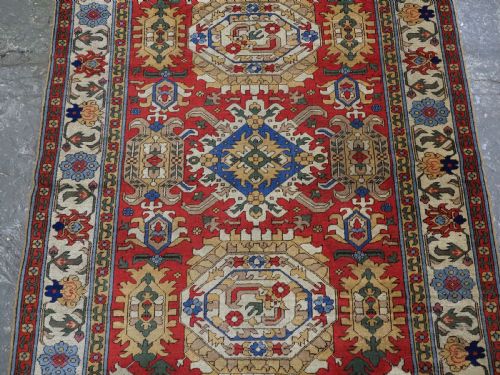 ANTIQUE RUG IN THE STYLE OF A CAUCASIAN KARABAGH 18TH CENTURY 'BLOSSOM' RUG CIRCA 1920 - ADDITIONAL PHOTO 3