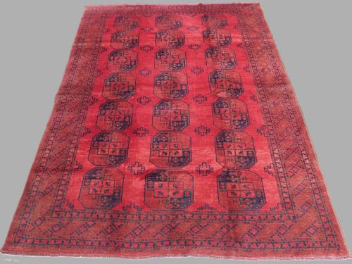 Antique Afghan Village Carpet, with Warm Red Colour, Circa 1920.