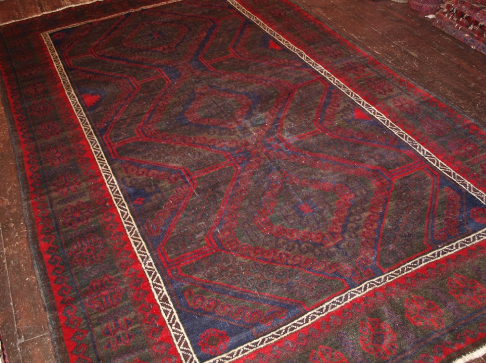 OLD AFGHAN VILLAGE RUG, TRADITIONAL ‘MUSHWANI’ DESIGN, ABOUT 80 YEARS OLD.