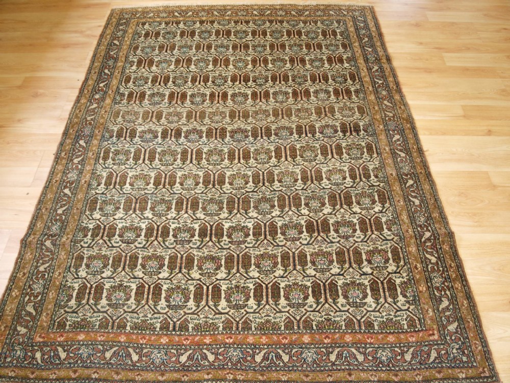 ANTIQUE ISFAHAN RUG WITH ALL OVER REPEAT DESIGN, CIRCA 1910.