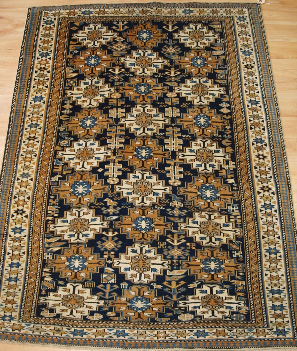 ANTIQUE CAUCASIAN SHIRVAN RUG OF SMALL SIZE AND FINE WEAVE, CIRCA 1900