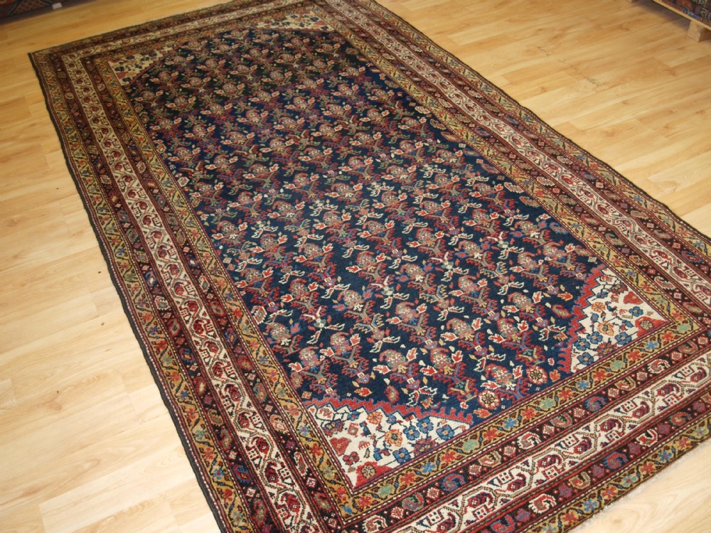 ANTIQUE NORTH WEST PERSIAN MALAYER KELLEH RUG WITH SHRUB DESIGN AND SUPERB COLOUR, CIRCA 1900.