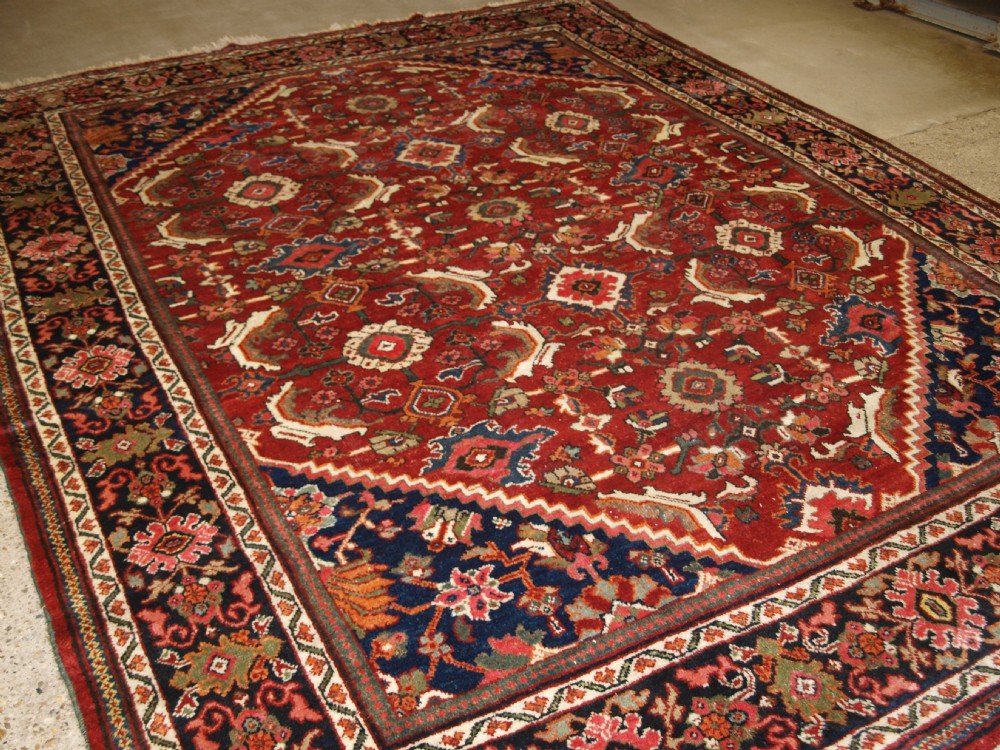 OLD TADITIONAL CARPET, LARGE SCALE ALL OVER DESIGN, CIRCA 1920.