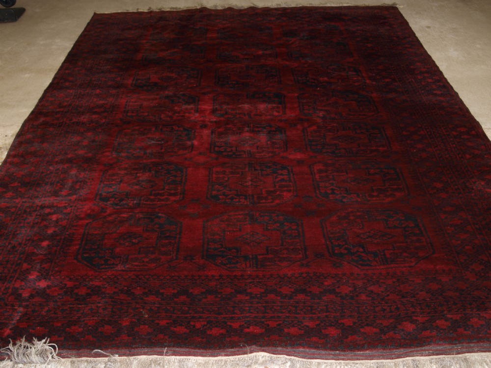 OLD TRADITIONAL AFGHAN VILLAGE CARPET, VERY DEEP RICH RED COLOUR, SUPERB CONDITION, CIRCA 1920.