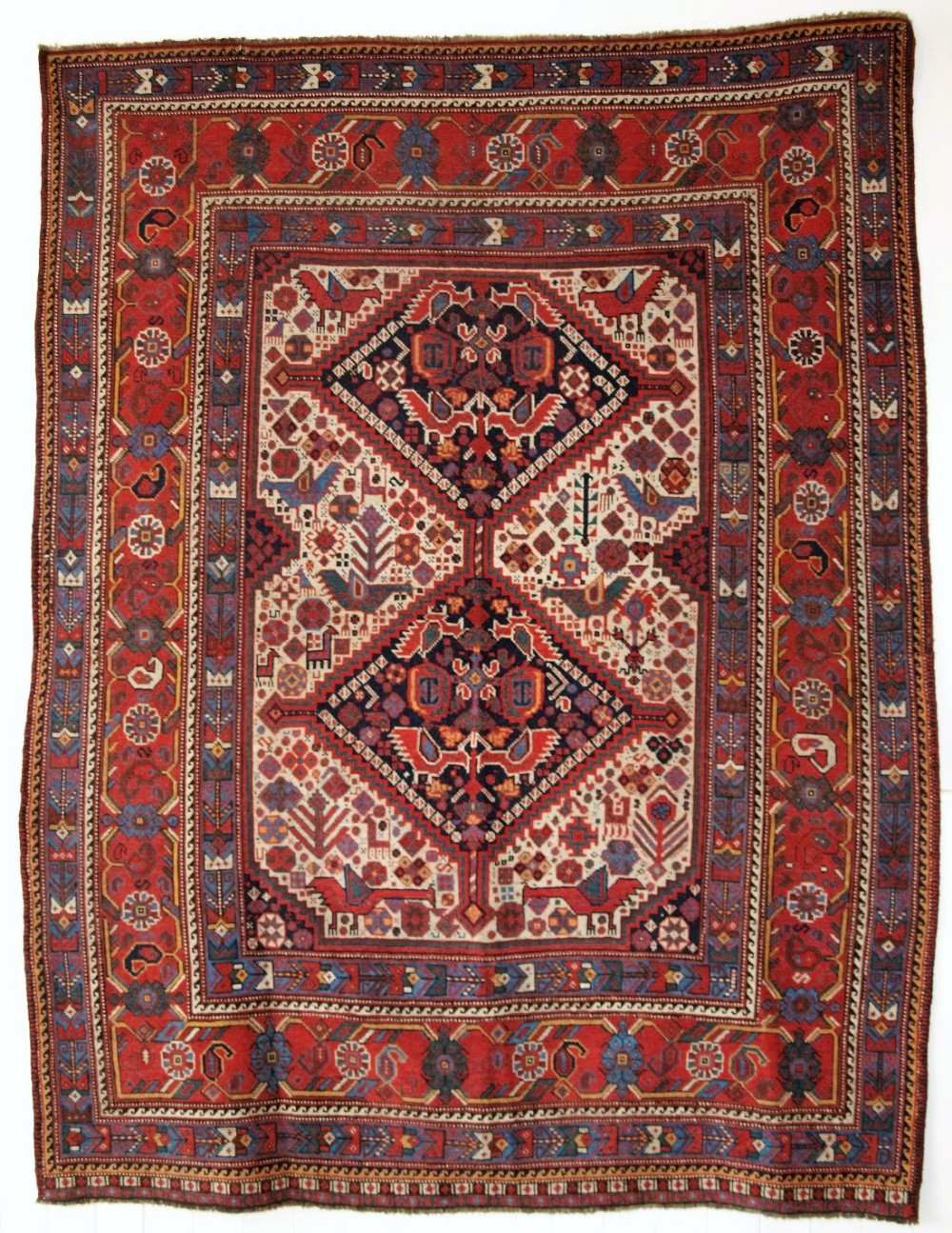 ANTIQUE SOUTH WEST PERSIAN KHAMSEH TRIBAL 'BIRD' RUG, CIRCA 1880.