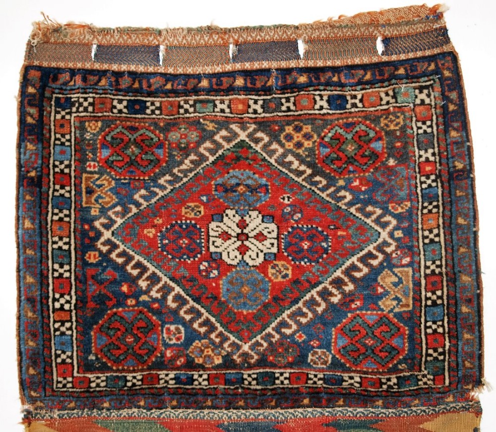 ANTIQUE SOUTH WEST PERSIAN SADDLE BAG BY THE LURI TRIBE, SUPERB BACK, CIRCA 1900.