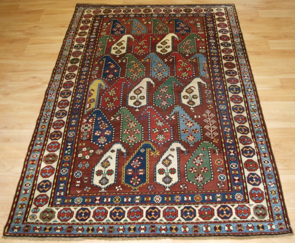 ANTIQUE CAUCASIAN KARABAGH RUG WITH LARGE BOTEH DESIGN, SUPERB COLOUR, LATE 19TH CENTURY.