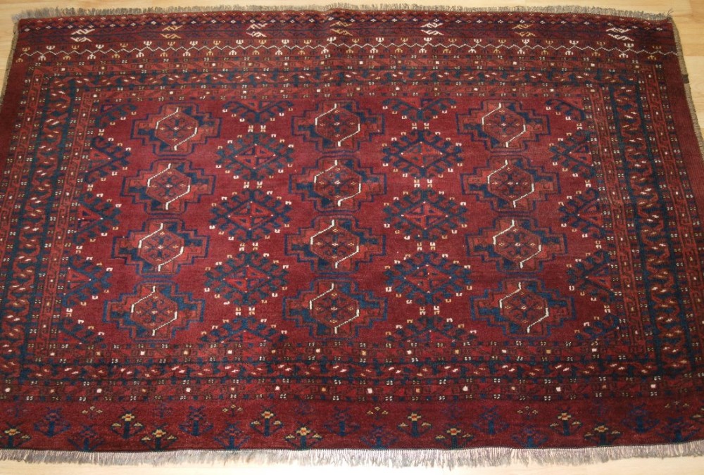 ANTIQUE ERSARI TURKMEN CHUVAL, 12 GUL DESIGN, SUPERB FULL PILE CONDITION, CIRCA 1900.