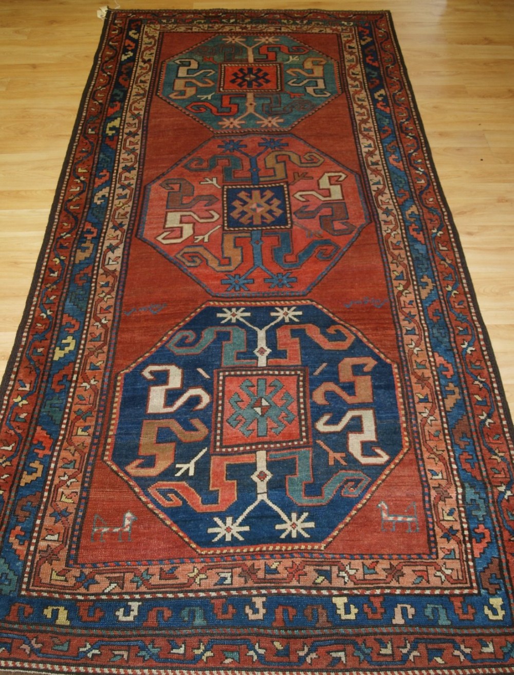 ANTIQUE CAUCASIAN KARABAGH VILLAGE RUG WITH CLOUD BAND KAZAK DESIGN, CIRCA 1880.