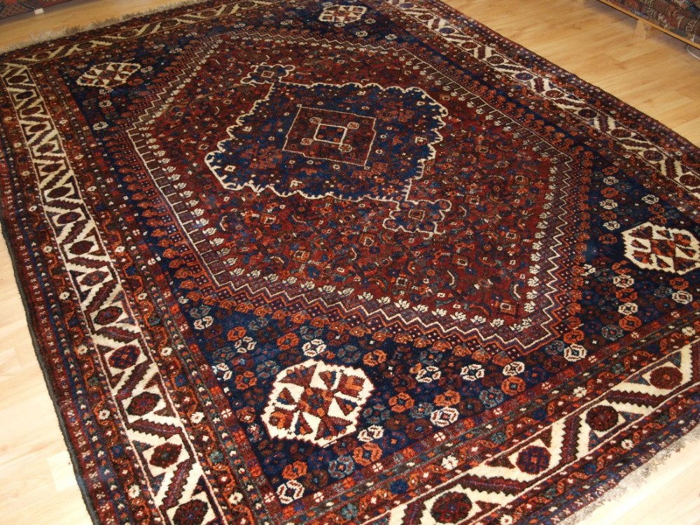 OLD SHIRAZ REGION CARPET WITH TRIBAL DESIGN, GREAT CONDITION, CIRCA 1920.