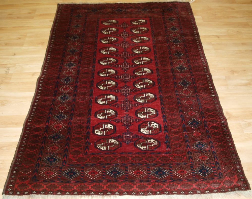 OLD AFGHAN VILLAGE RUG, TRADITIONAL DESIGN, RICH COLOURS, HARD WEARING, CIRCA 1920.