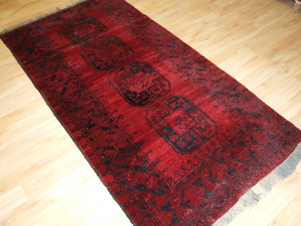 OLD AFGHAN VILLAGE RUG, TRADITIONAL ERSARI DESIGN, SOFT RED COLOUR, HARD WEARING, CIRCA 1920.