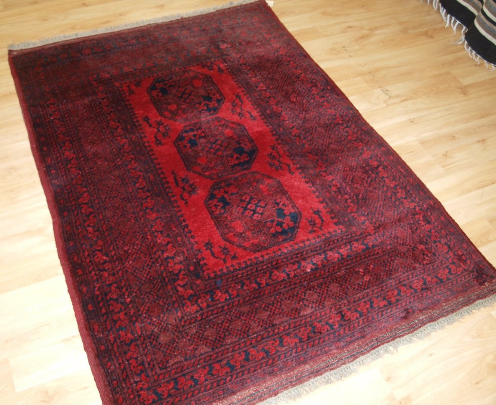OLD AFGHAN VILLAGE RUG WITH TRADITIONAL DESIGN, SUPERB COLOUR AND CONDITION, CIRCA 1920.