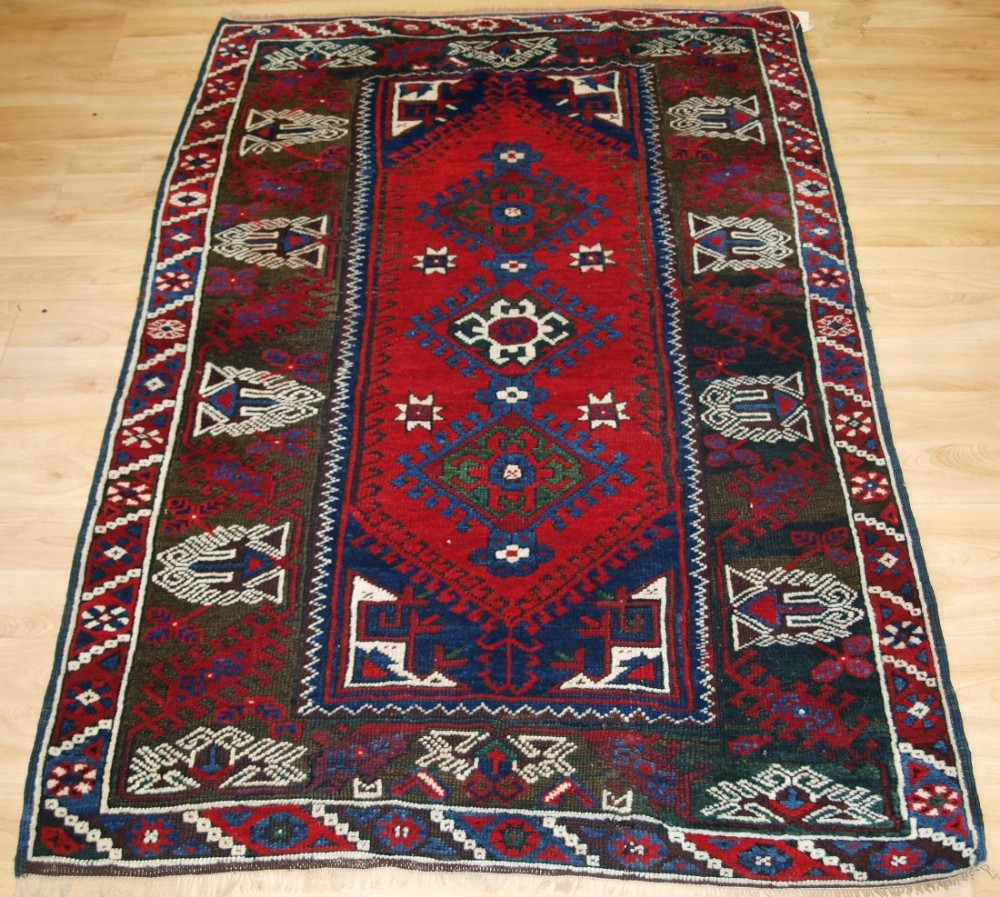 OLD TURKISH DOSEMEALTI VILLAGE RUG OF TRADITIONAL DESIGN, SUPERB CONDITION, CIRCA 1920.