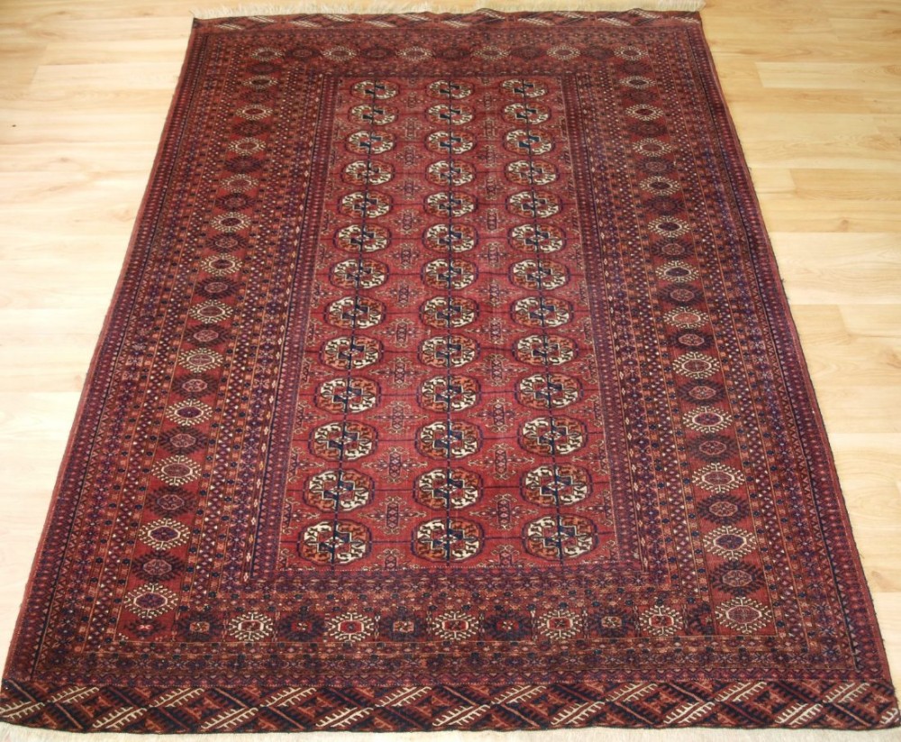ANTIQUE TEKKE TURKMEN RUG, EXCELLENT CONDITION WITH GOOD COLOUR, CIRCA 1900.