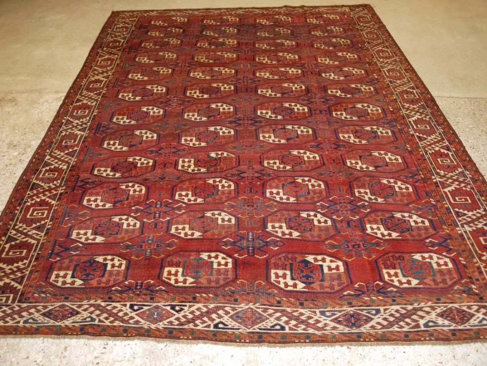 ANTIQUE KIZYL AYAK ERSARI TURKMEN MAIN CARPET, CURL LEAF BORDER, SUPERB COLOUR AND DRAWING, CIRCA 1870.