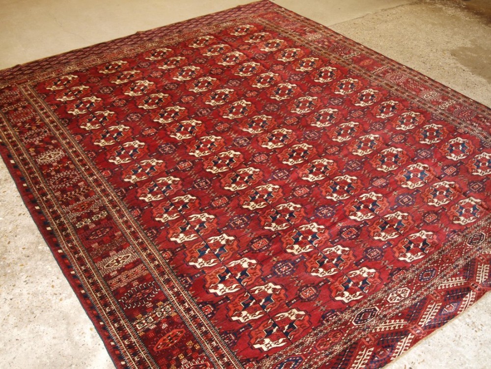 ANTIQUE TEKKE TURKMEN MAIN CARPET, SMALL SQUARE SIZE, SUPERB BORDER DESIGN, GREAT COLOUR, CIRCA 1880.