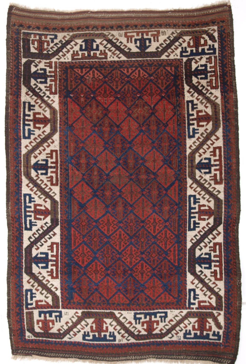 ANTIQUE BALUCH RUG OF SMALL SIZE, WITH IVORY BOAT BORDER AND LATTICE DESIGN, CIRCA 1880.