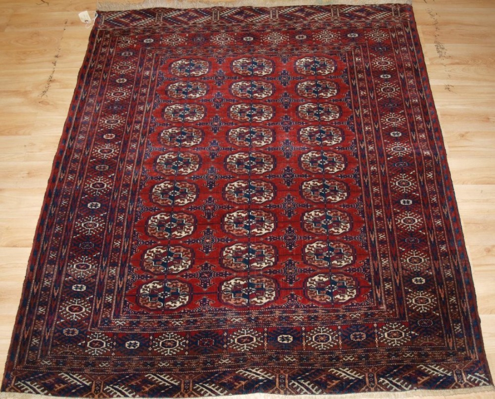 ANTIQUE TEKKE TURKMEN RUG, SMALL SIZE WITH RICH RED COLOUR, CIRCA 1900