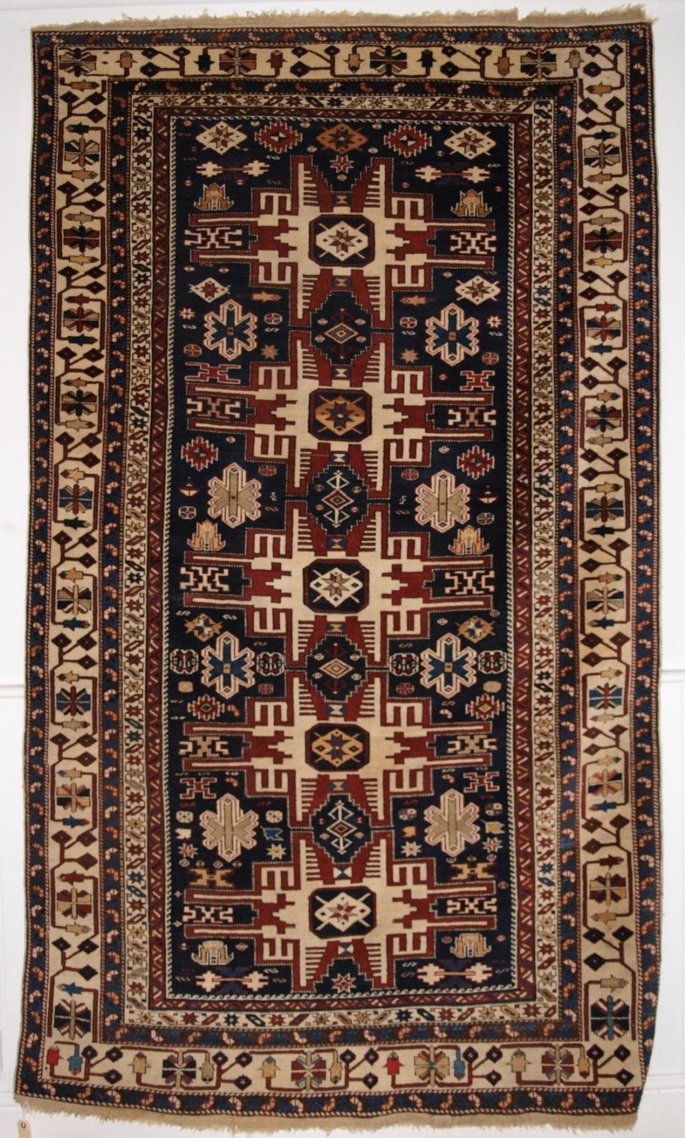 ANTIQUE CAUCASIAN SHIRVAN RUG WITH STAR DESIGN, BEAUTIFUL BORDER, CIRCA 1900.