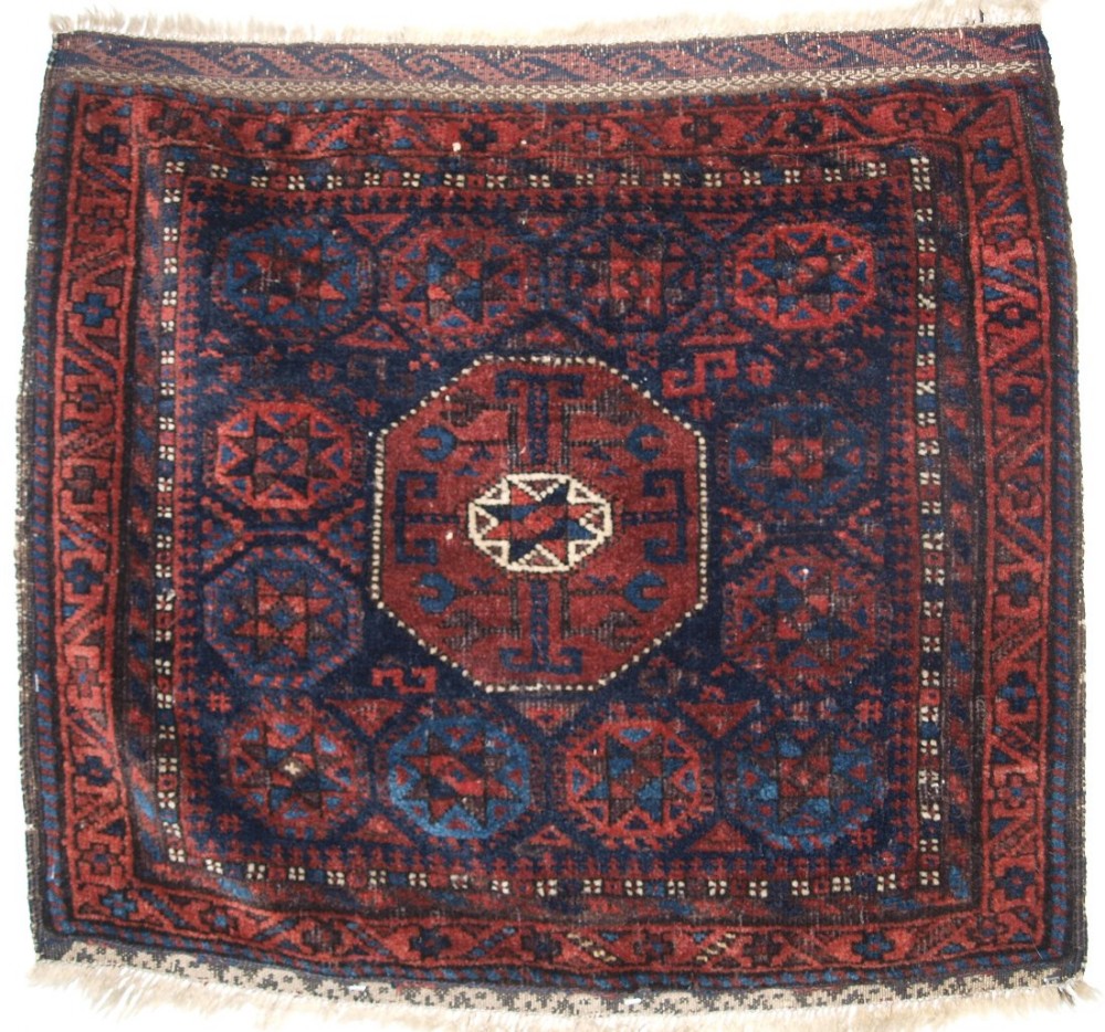 ANTIQUE BALUCH SADDLE BAG FACE, 'STAR IN OCTAGON DESIGN', SCARCE SMALL SIZE, CIRCA 1880.