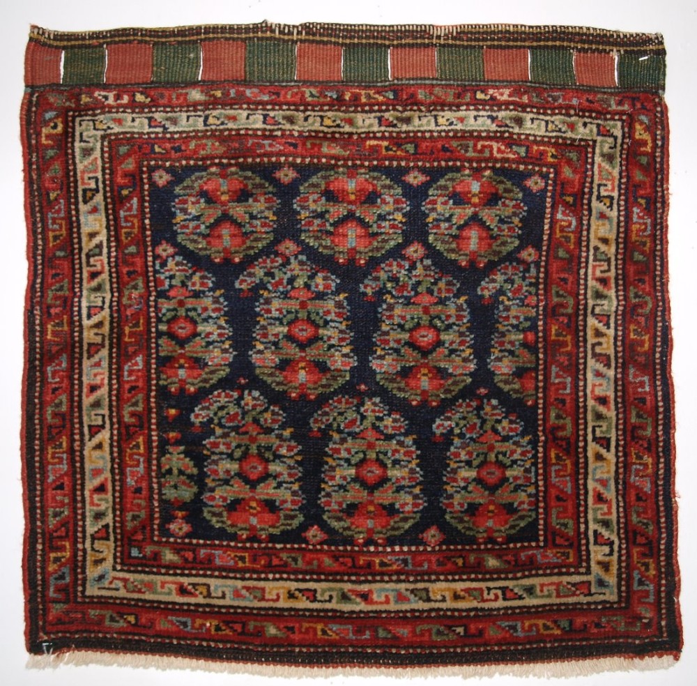 ANTIQUE NORTH WEST PERSIAN KURDISH BAGFACE WITH FLORAL BOTEH DESIGN, CIRCA 1900.