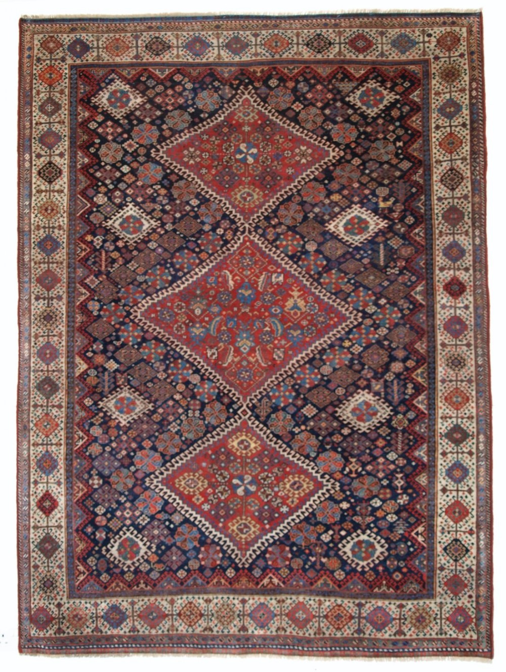 ANTIQUE QASHQAI RUG, SHEKARLU BORDER, TRIPLE MEDALLION, SUPERB. CIRCA 1860.