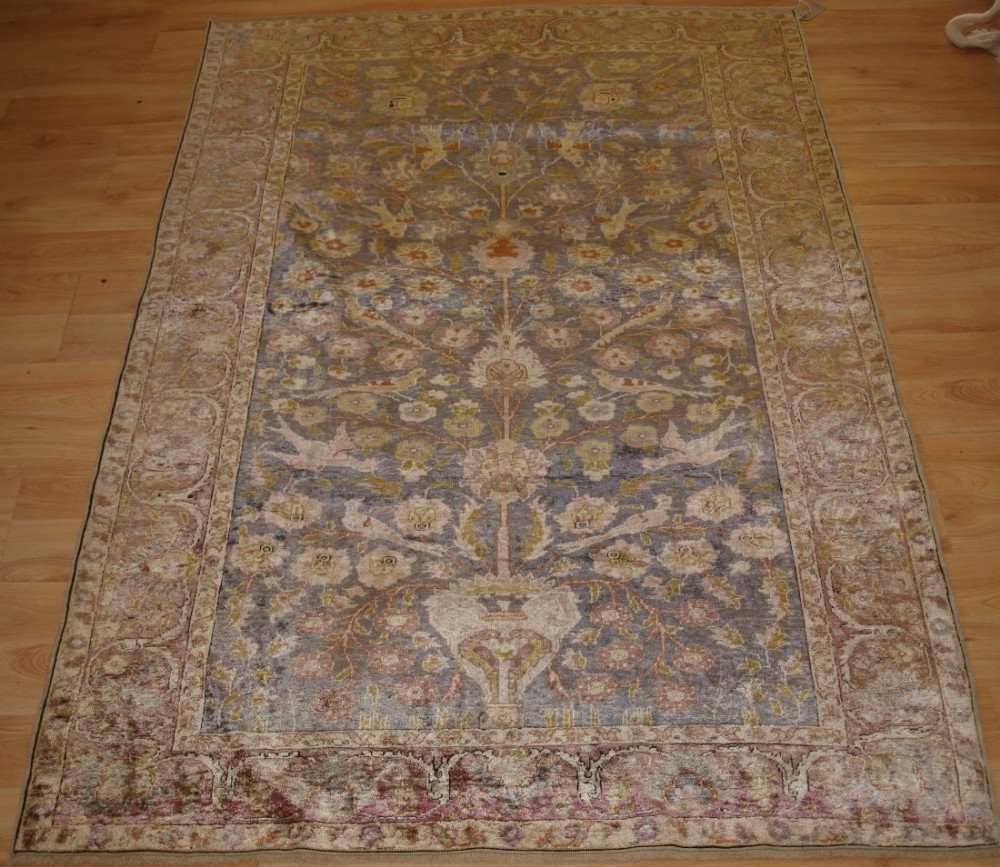 ANTIQUE TURKISH KAYSERI SILK RUG, FLORAL DESIGN WITH BIRDS, LATE 19TH CENTURY.