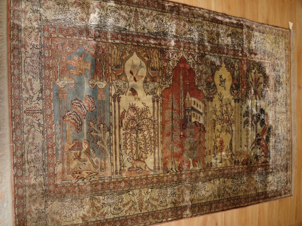 OLD TURKISH KAYSERI 'ART SILK' RUG, PRAYER SAF DESIGN, BIRDS & ANIMALS, CIRCA 1920.