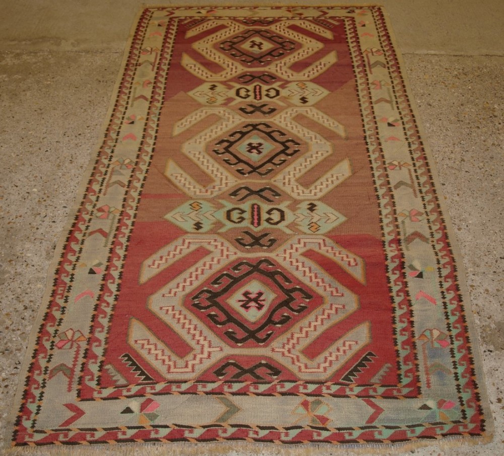 OLD CAUCASIAN KILIM RUG, CLASSIC LENKORAN VILLAGE DESIGN, WITH SOFT FADED COLOURS. CIRCA 1920.