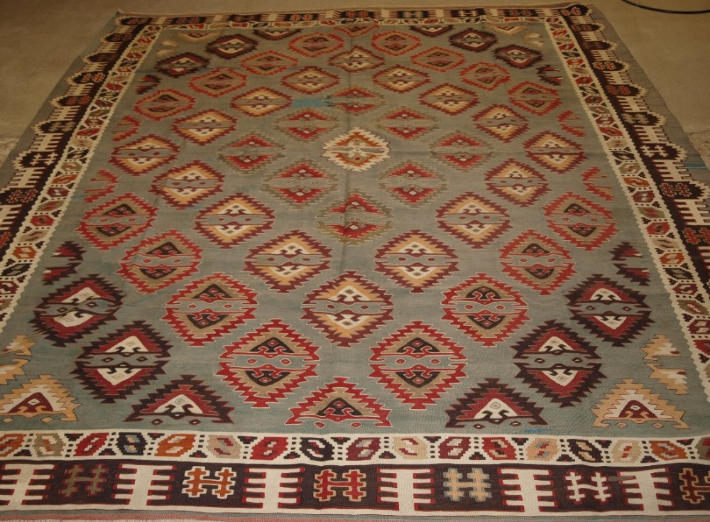 ANTIQUE TURKISH SARKOY KILIM RUG, RARE DESIGN ON SOFT POWDER BLUE GROUND, CIRCA 1900.
