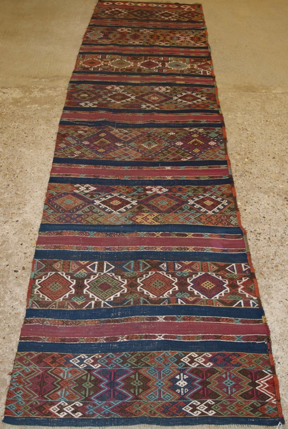 OLD TURKISH MALAYTA KILIM RUG RUNNER IN EMBROIDERED WEAVE, TRADITIONAL VILLAGE DESIGN, CIRCA 1920.