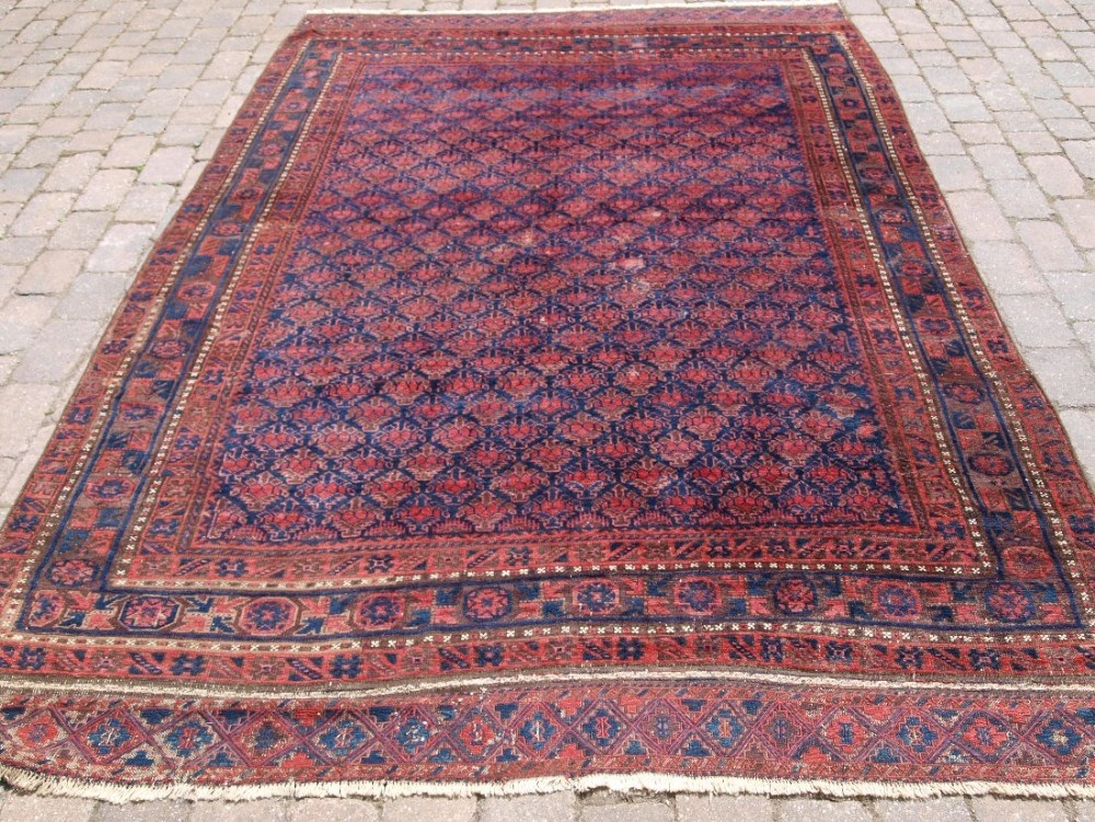 ANTIQUE TIMURI BALUCH MAIN CARPET, EXCELLENT COLOUR, UNUSUAL SHRUB DESIGN, 2ND HALF 19TH CENTURY.