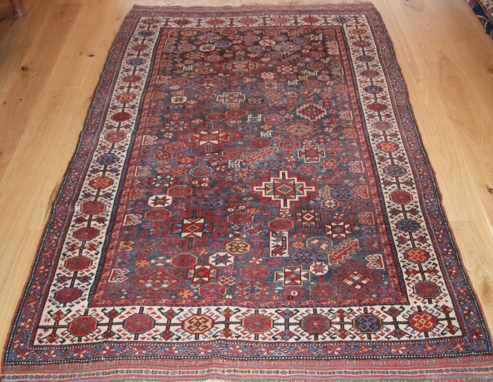 ANTIQUE SOUTH WEST PERSIAN LURI RUG WITH SHEKARLU DESIGN, CIRCA 1900.