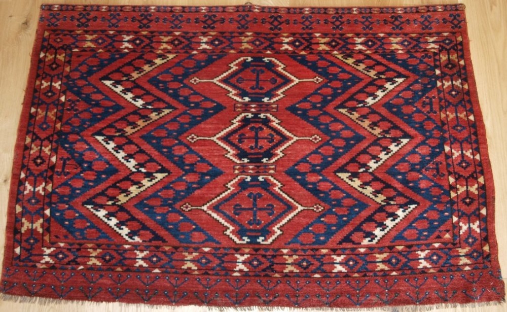 ANTIQUE ERSARI BESHIR TURKMEN CHUVAL WITH IKAT DESIGN, SUPERB COLOUR, FULL PILE, CIRCA 1880.