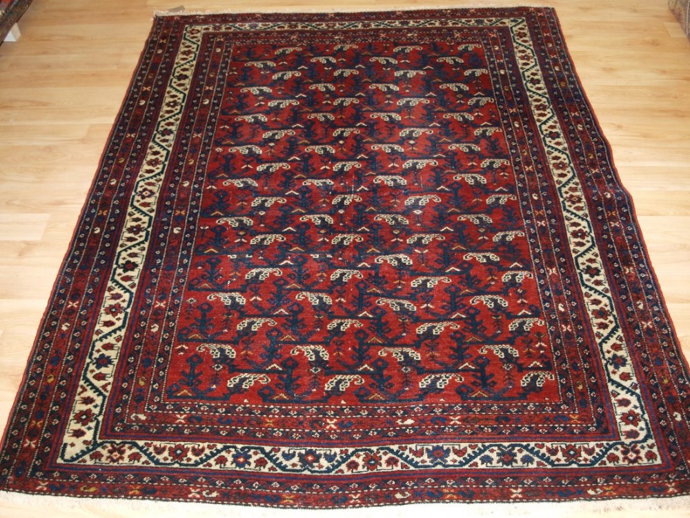 ANTIQUE VILLAGE RUG, GREATER HAMADAN REGION, SHRUB DESIGN, CIRCA 1900/20.