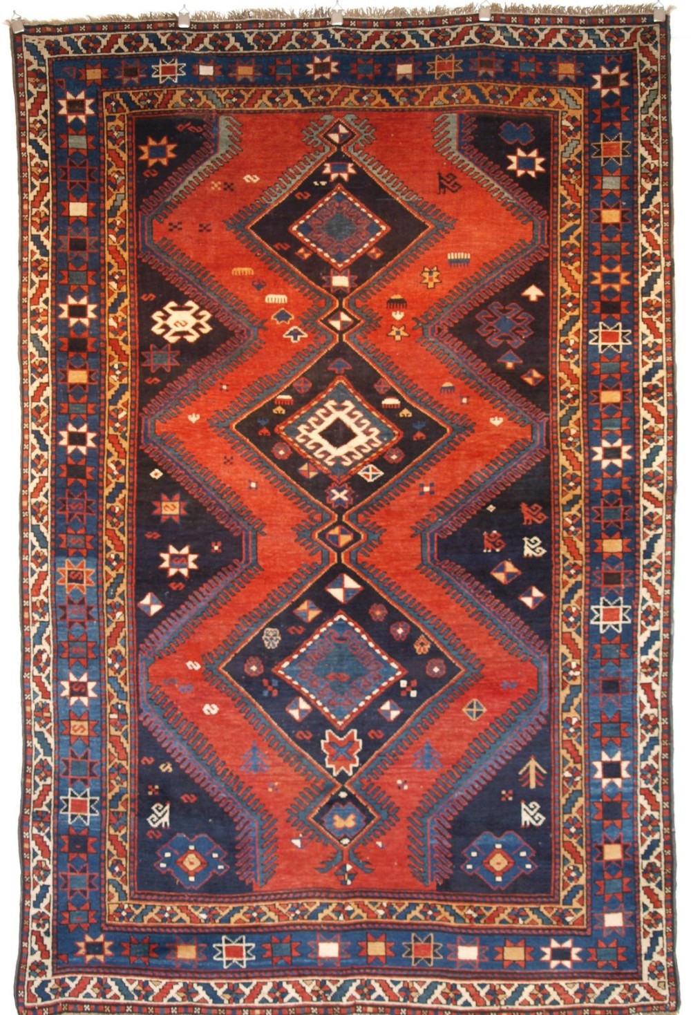 ANTIQUE SOUTH WEST CAUCASIAN ARMENIAN KAZAK RUG, LINKED MEDALLION DESIGN, CIRCA 1900.