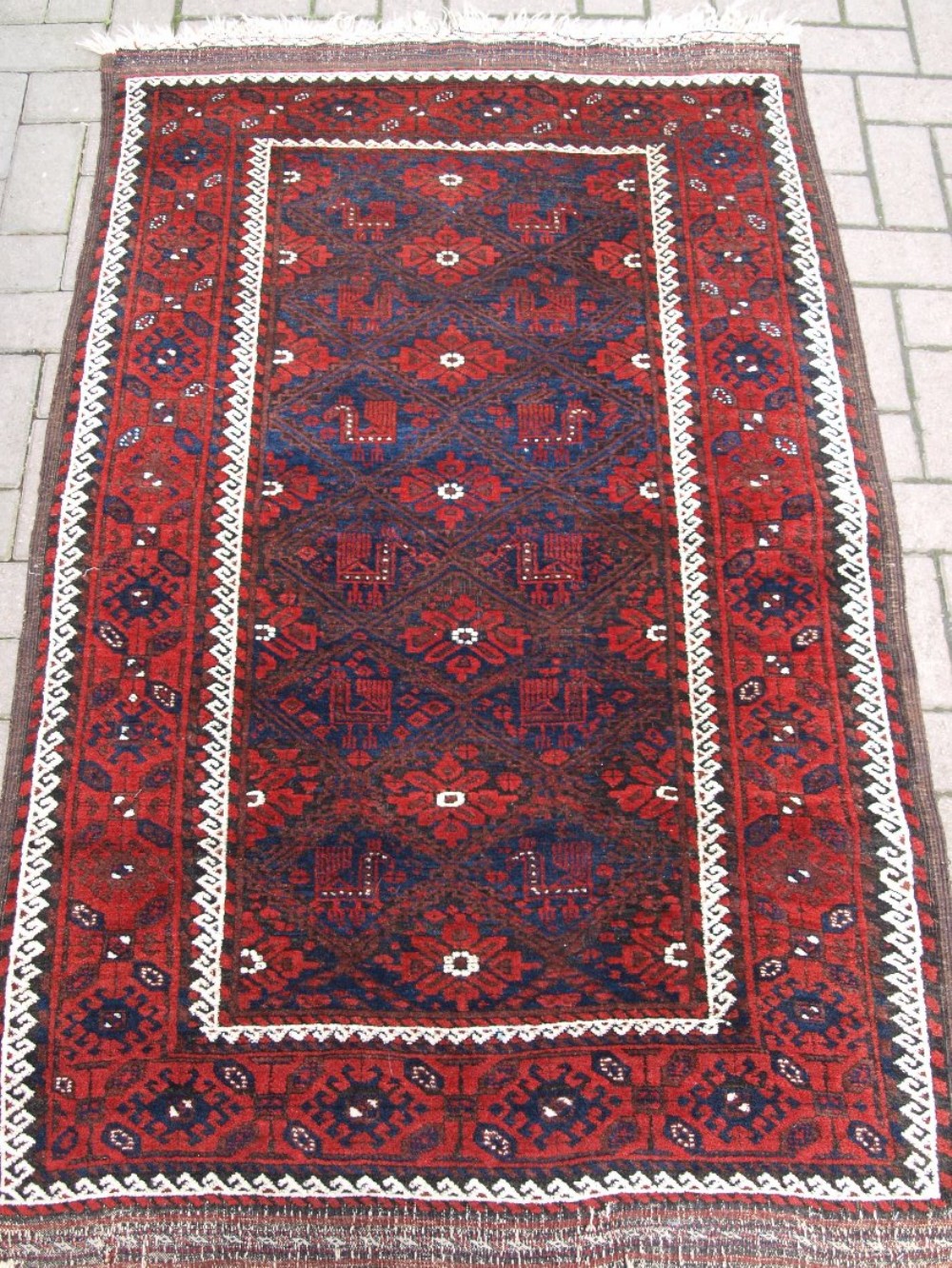 ANTIQUE 'BIRD' BALUCH RUG, LATTICE DESIGN WITH BIRDS, SUPERB COLOURS, CIRCA 1890.