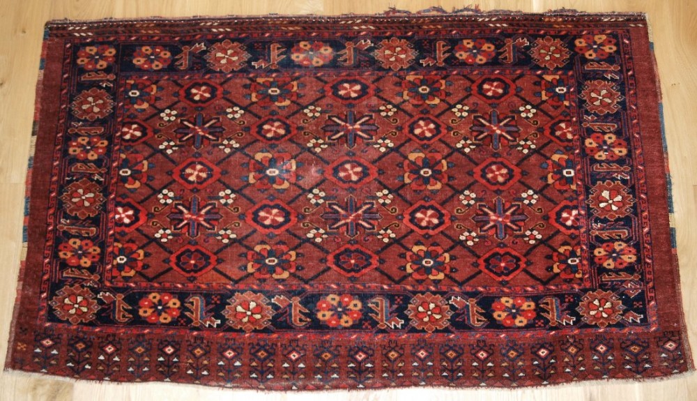 ANTIQUE BESHIR TURKMEN CHUVAL, MINA KHANI DESIGN WITH SILK HIGHLIGHTS, CIRCA 1880.