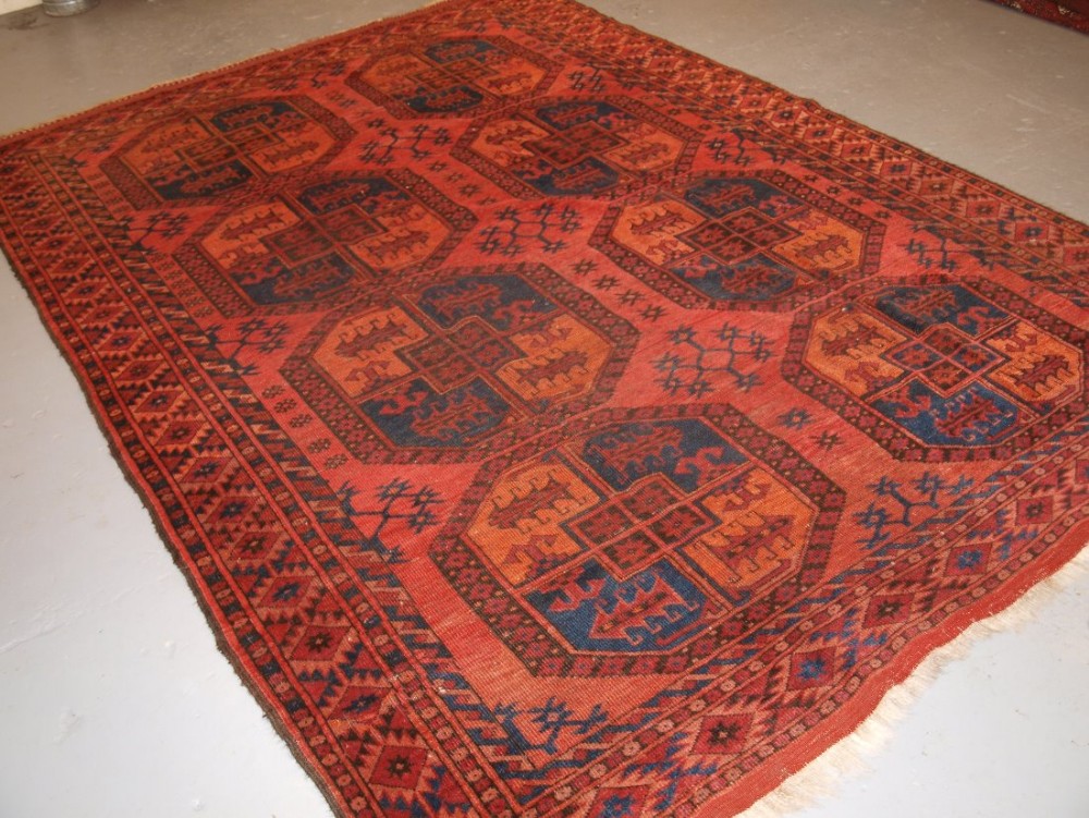 ANTIQUE AFGHAN ERSARI TURKMEN MAIN CARPET, SMALL SIZE WITH VERY LARGE GULS, CIRCA 1900.