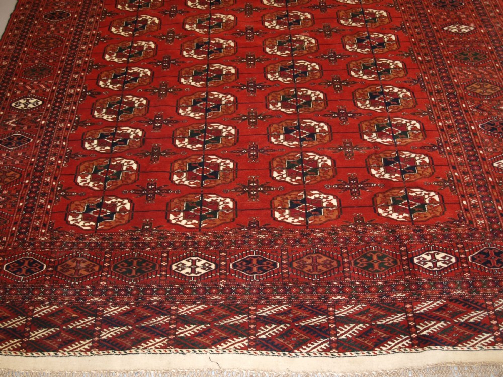 ANTIQUE TEKKE TURKMEN MAIN CARPET, FULL PILE, SOFT WOOL, CIRCA 1900. View IV