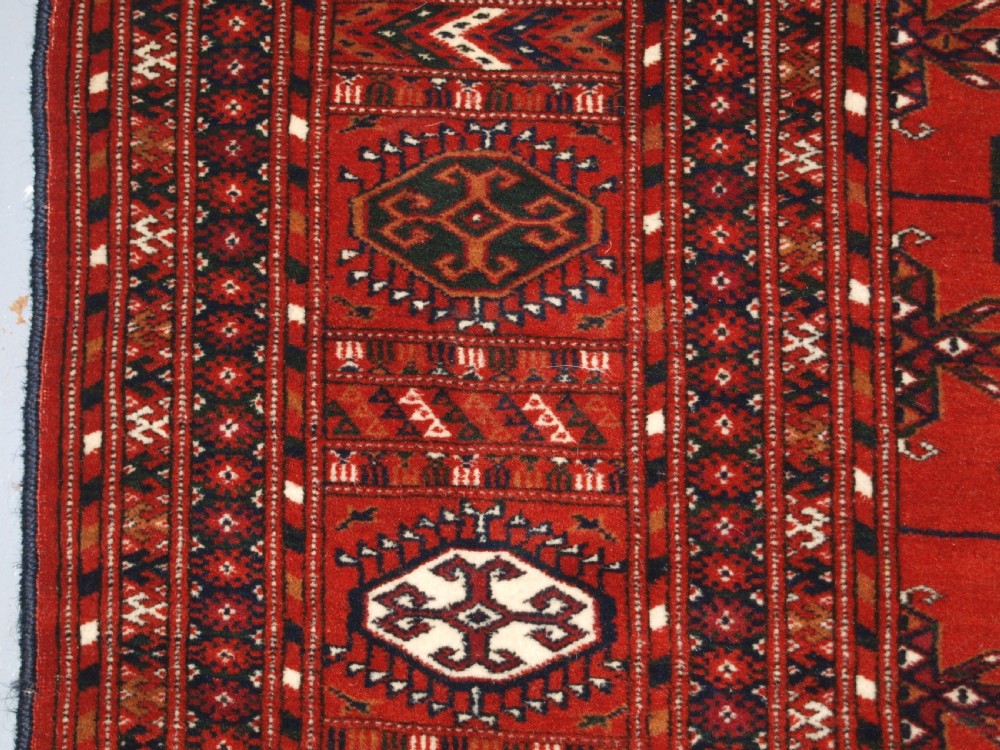 ANTIQUE TEKKE TURKMEN MAIN CARPET, FULL PILE, SOFT WOOL, CIRCA 1900. View VI
