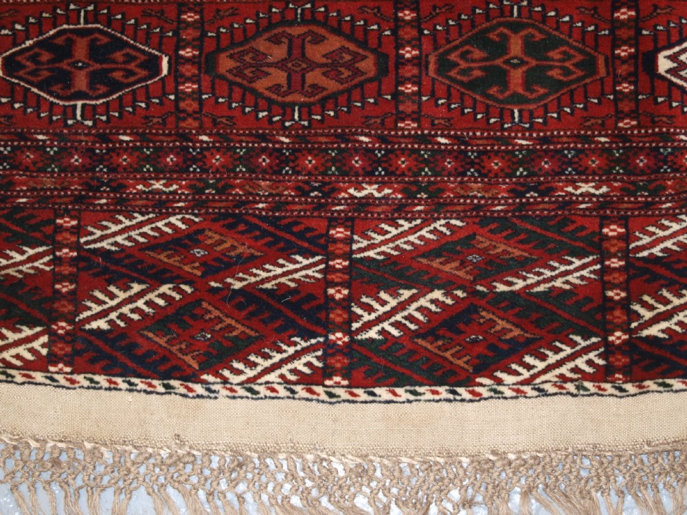 ANTIQUE TEKKE TURKMEN MAIN CARPET, FULL PILE, SOFT WOOL, CIRCA 1900. View XI
