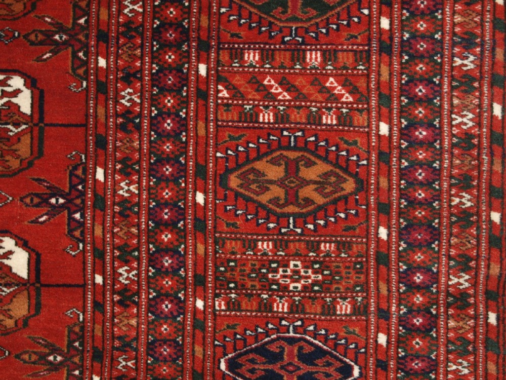ANTIQUE TEKKE TURKMEN MAIN CARPET, FULL PILE, SOFT WOOL, CIRCA 1900. View XII