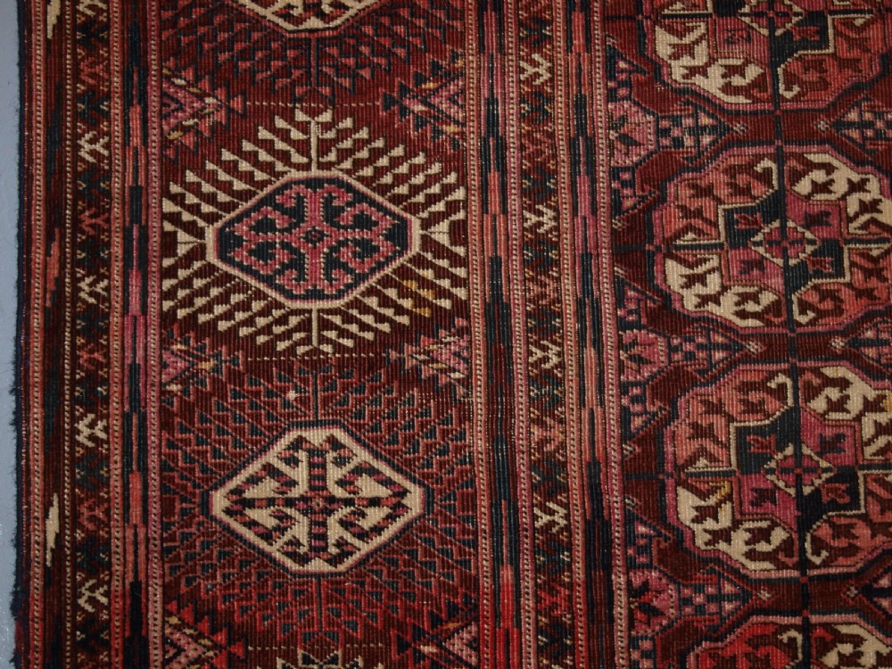 ANTIQUE TEKKE TURKMEN CARPET OF UNUSUAL LARGE SIZE, GOOD COLOUR, CIRCA 1900. View IV