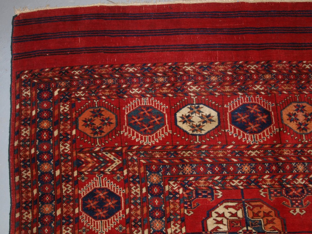 ANTIQUE TEKKE TURKMEN MAIN CARPET, UNUSUAL PILED ELEM END PANELS, 4TH QUARTER 19TH CENTURY. View II
