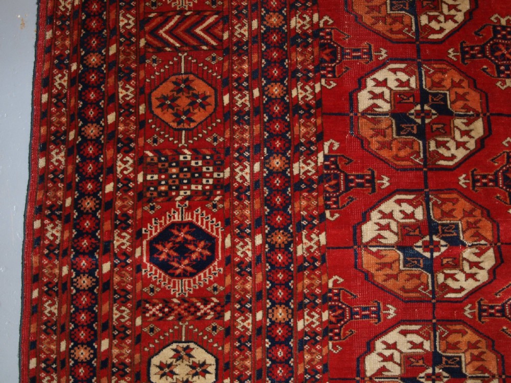ANTIQUE TEKKE TURKMEN MAIN CARPET, UNUSUAL PILED ELEM END PANELS, 4TH QUARTER 19TH CENTURY. View III